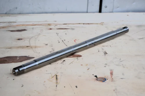 Вісь задньої навіски МТЗ 70-4605026 (вир-во Оригинал Р.Б МТЗ)