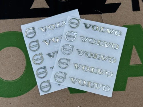 Набір металевих 3D наклейок Volvo (логотип + надпис, хром, 10 шт)