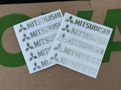 Набір металевих 3D наклейок Mitsubishi (логотип + надпис, хром, 10 шт)